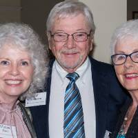 Marcia Haas with two guests.